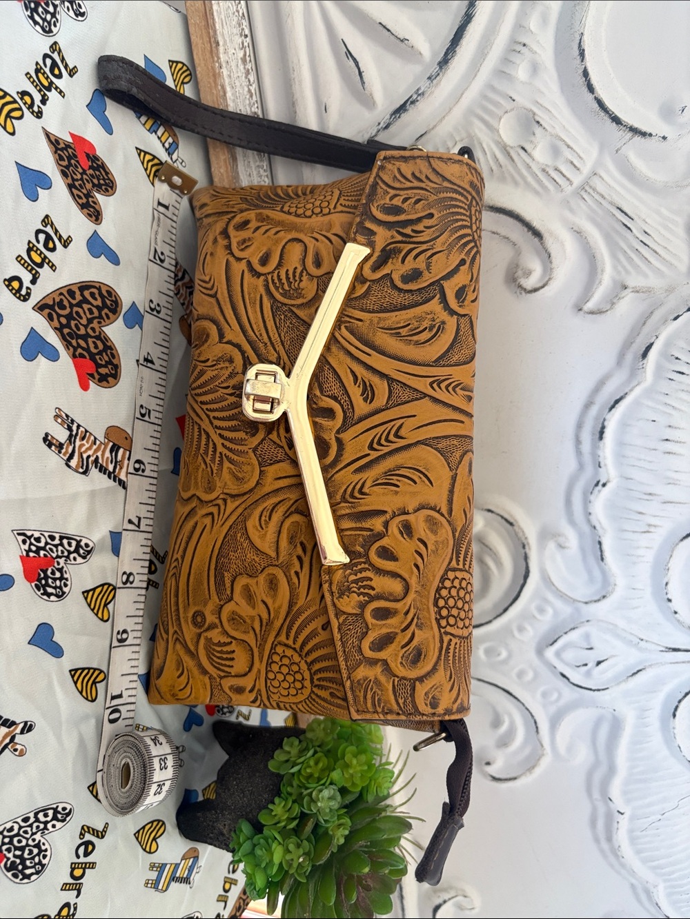 Tooled Leather Wristlet Clutch in Tan with Gold Accent
